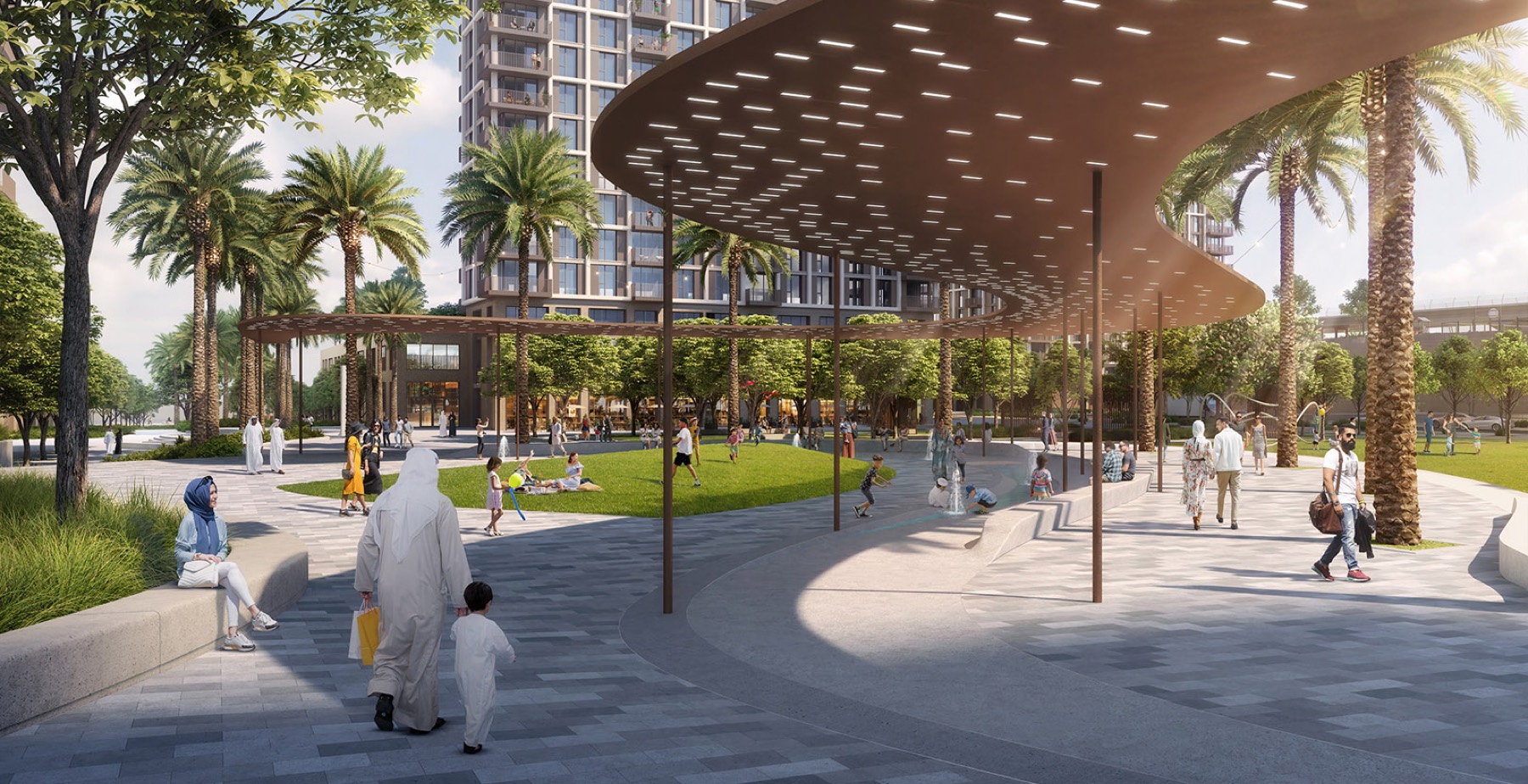 Aeon twin towers across the community park lawn at Dubai Creek Harbour