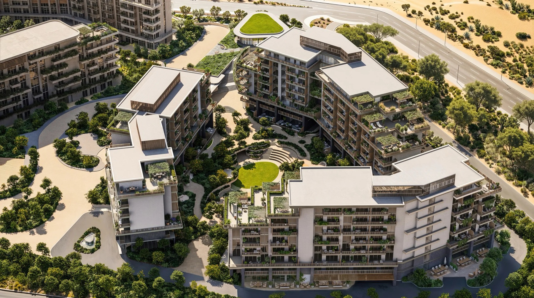 Aerial render of Arancia at The Yards — low-rise buildings around a landscaped green courtyard in City of Arabia, Dubai