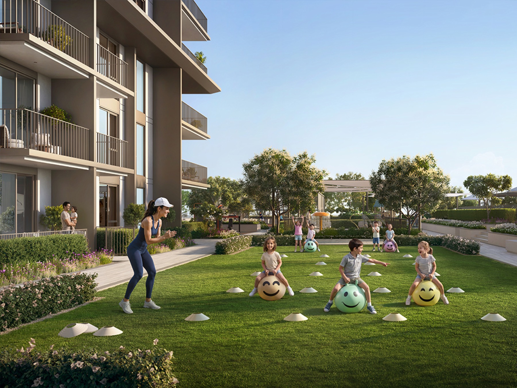 Podium lawn and play area at the base of the Golf Trails building