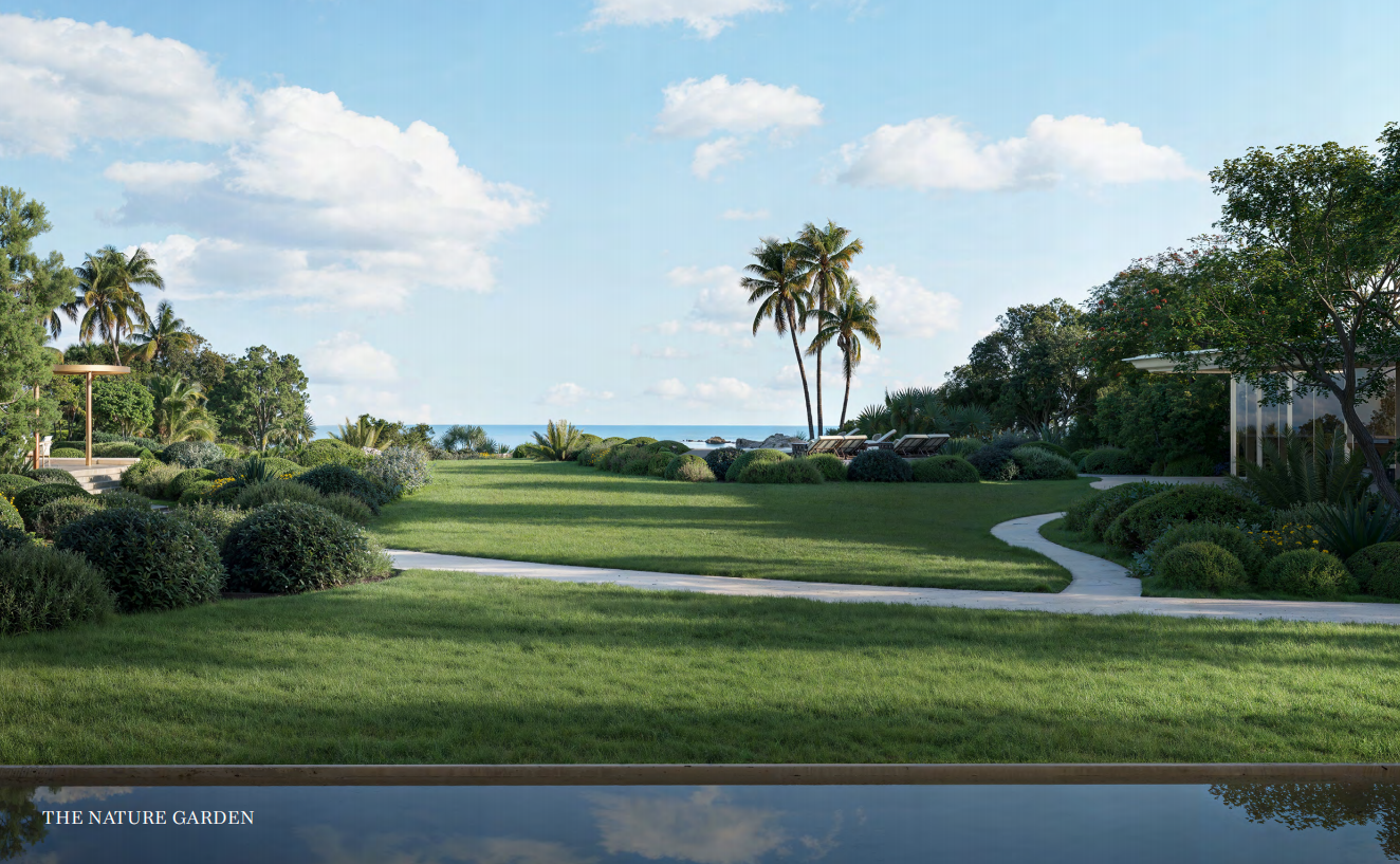 The nature garden lawns running toward the sea at Asora Bay