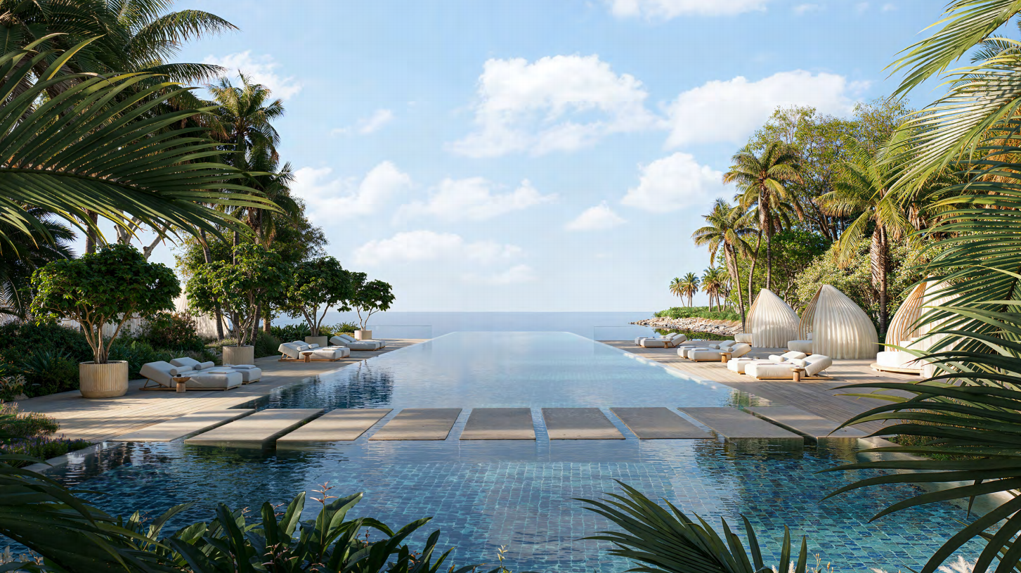 Infinity pool framed by palms at Jumeirah Asora Bay