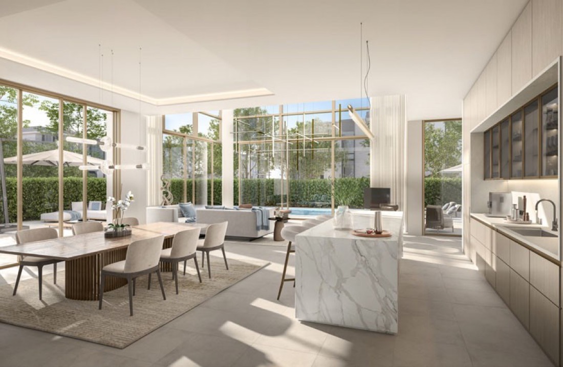 Open-plan living, dining and kitchen with garden views