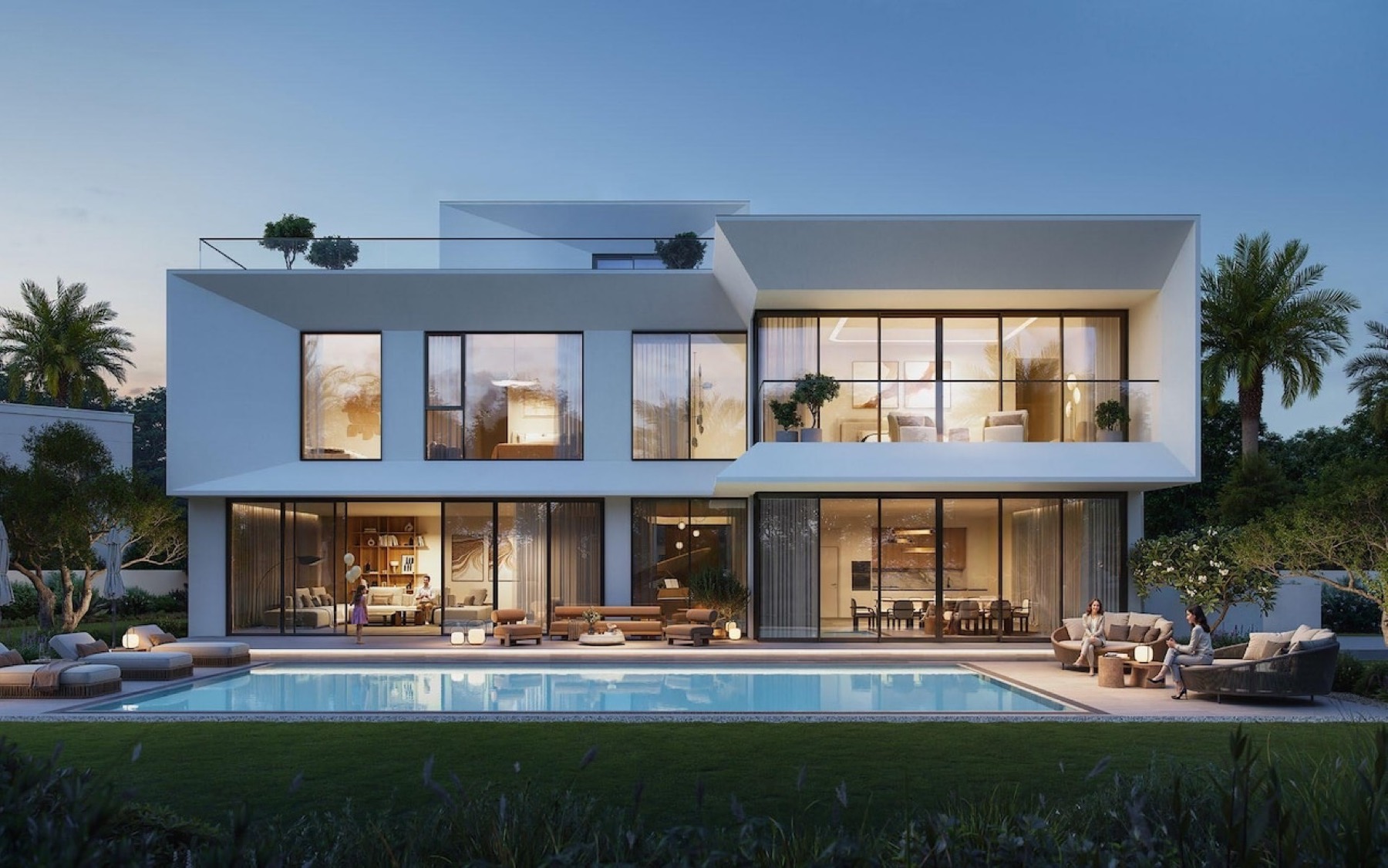 Marèva villa at twilight with private pool and lit interiors