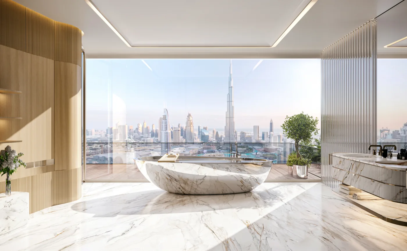 Marble bathroom with a freestanding bath facing the Burj Khalifa, Bugatti Residences