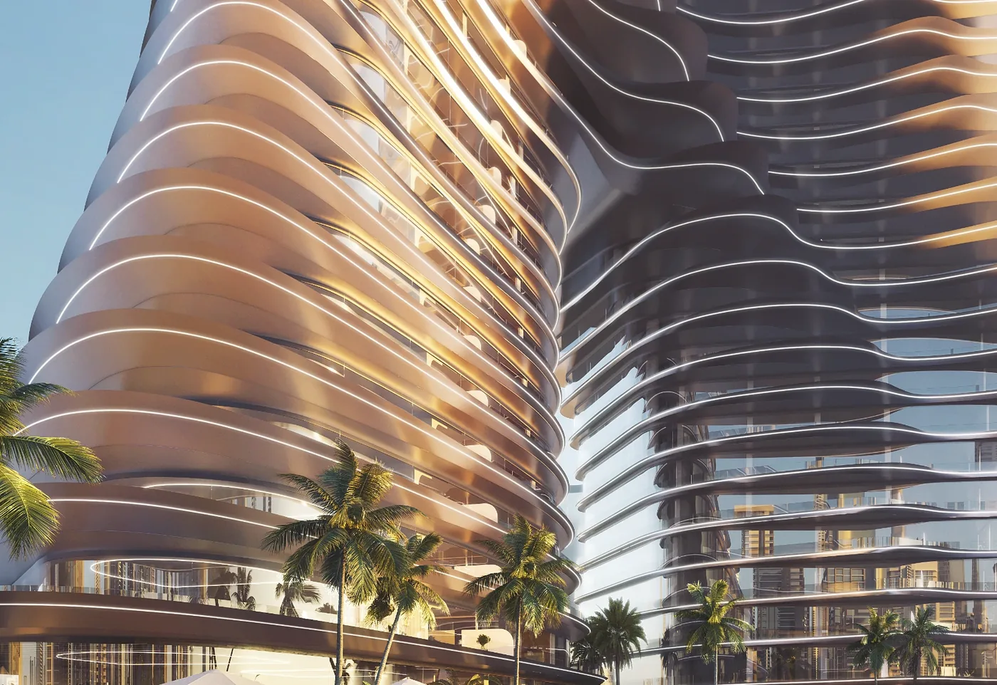 Sculptural rippling facade of Bugatti Residences in daylight, with palms at the podium