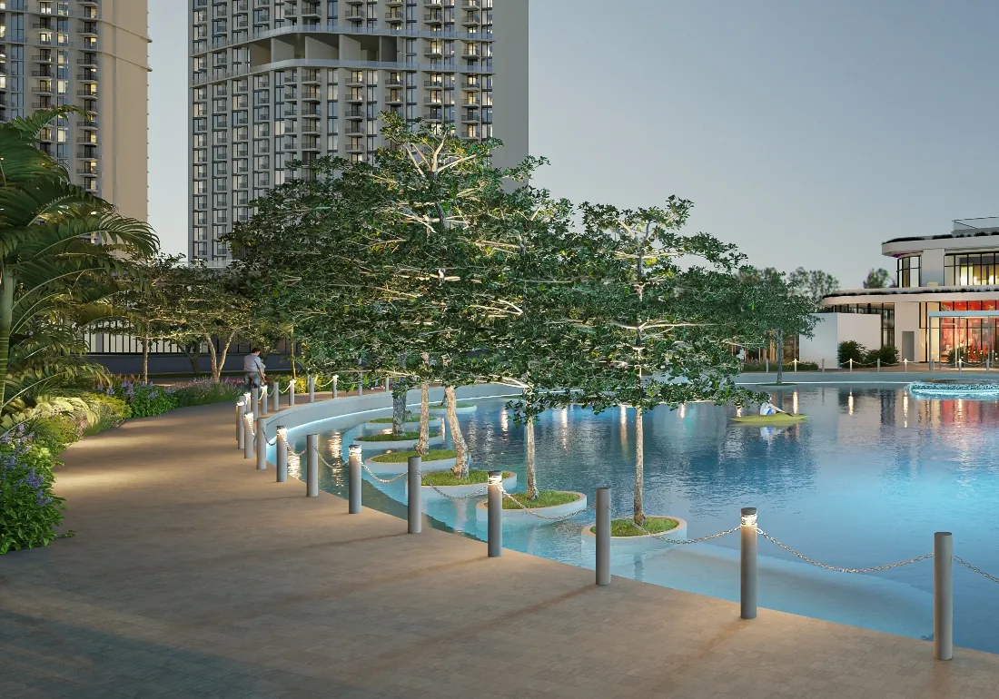 Lagoon promenade at dusk with floating planters and lighting beside the towers, Sobha Hartland II